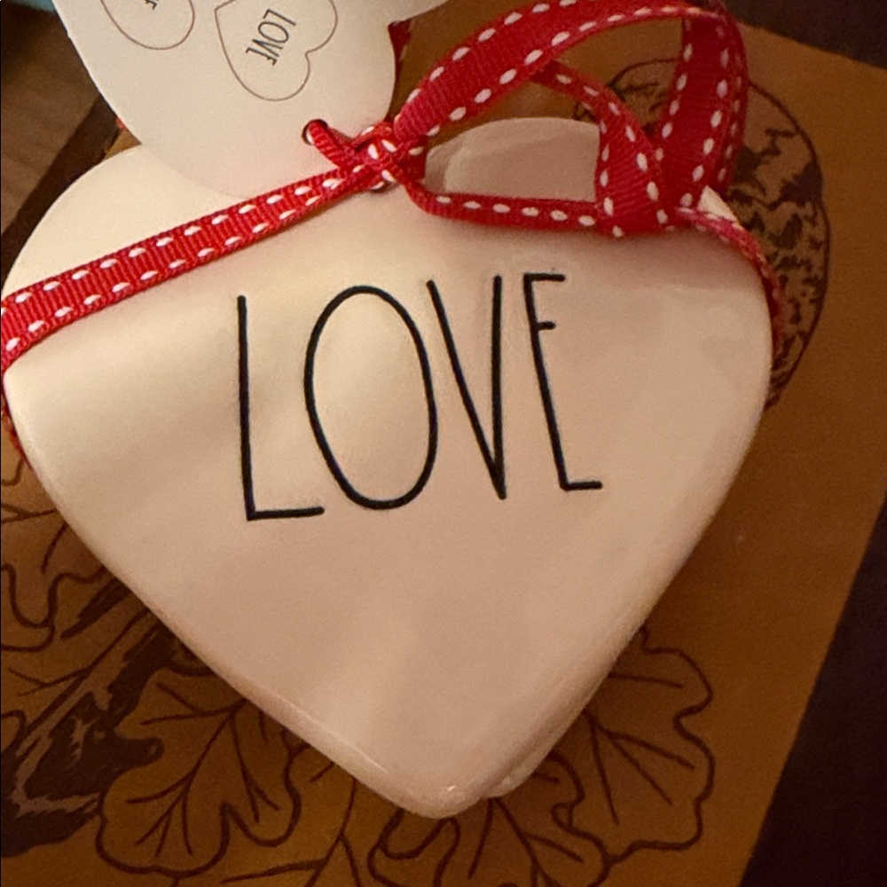 Heart-Shaped Ceramic Decor with Red Ribbon